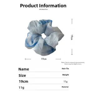 Detail view of a large blue and white mesh scrunchie with 19cm diameter and 11g weight