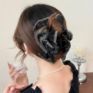 Elegant large black mesh bow hair claw with sparkling rhinestones for hair styling