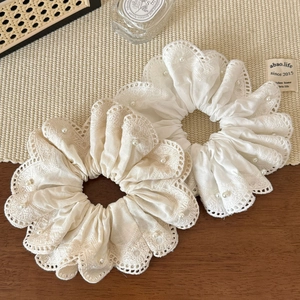 Beige and white lace scrunchies with pearls for elegant bun styling and ponytails
