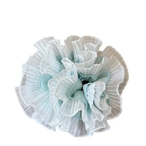 Elegant two-tone pleated chiffon scrunchie with layered ruffle design in white and blue