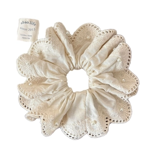 Beige lace scrunchie with faux pearls and textured fabric for ponytail styling