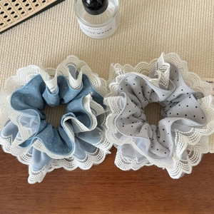Set of two large lace scrunchies with polka dots in blue and grey for elegant hair styling
