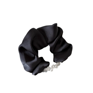 Elegant black satin scrunchie with sparkling crystal beads for high-end hairstyling