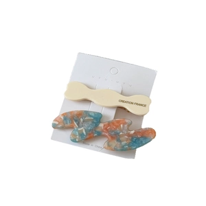Set of minimalist irregular wave acetate hair clips with marble texture on display card