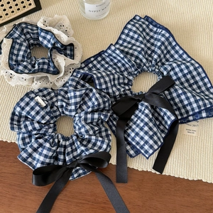 Blue and white checkered hair scrunchies with lace trim and elegant black ribbon bows