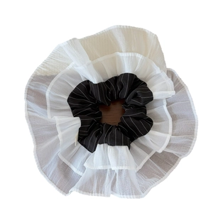Elegant multi-layer black and white mesh scrunchie with layered organza floral design