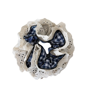 Vintage checkered oversized scrunchie with lace embroidery details on white background