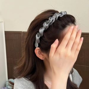 Elegant silver grey twisted satin headband with delicate butterfly crystal accents