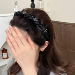 Elegant black woven headband with silver butterfly rhinestone accents for women