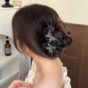 Elegant black satin bow hair claw clip with shimmering rhinestones for women hair styling