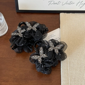 Elegant set of two black mesh flower hair claw clips with crystal butterfly accents