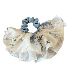 Blue and beige floral scrunchie with embroidery and ink style bamboo print pattern