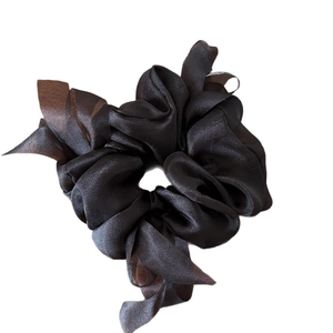 Elegant black ribbon scrunchie with long bow streamers in silky vintage fabric style