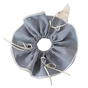 Chic blue and white houndstooth oversized scrunchie with delicate cream ribbon ties