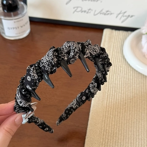Black paisley headband with black beads and punk spikes for high skull top hair style