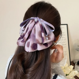 Pince à cheveux élégante violette effet marbré avec nœud et pendentifs en cristal pour femme