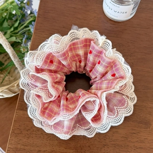 Elegant pink plaid scrunchie with red heart patterns and delicate lace trimming