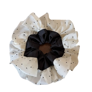 Oversized polka dot mesh scrunchie with black satin inner ring for ponytail hair styling