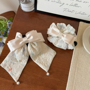 French lace pearl bow hair clip set with long satin ribbon and elegant cream embroidery