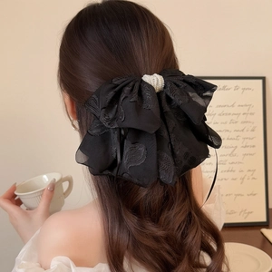 Barrette nœud papillon noire élégante avec broderie de feuilles et perle centrale délicate