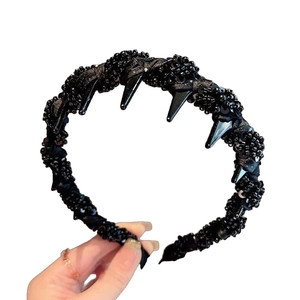 Elegant black beaded headband with sparkling sequins and non-slip inner teeth for women