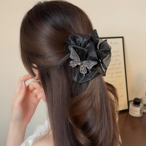 Pince à cheveux noire en maille avec papillon brillant et nœud en satin pour femmes