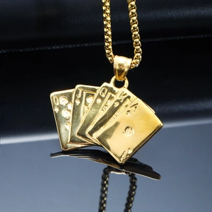 Detail of gold stainless steel royal flush poker card pendant with ball chain