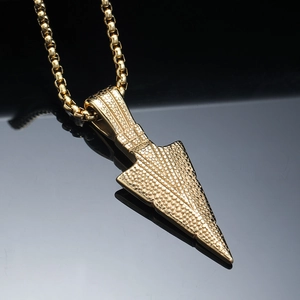 Golden spearhead pendant necklace with textured arrow design and round box chain