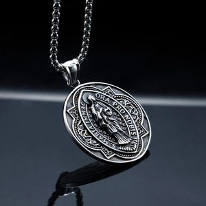 Vintage Virgin Mary relief pendant necklace in stainless steel with a punk cuban chain style
