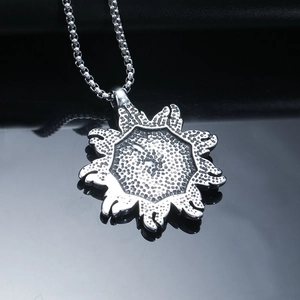 Vintage stainless steel sunburst eye pendant necklace with retro flame pattern and silver chain