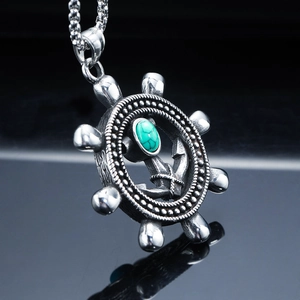 Vintage stainless steel nautical rudder and anchor pendant with turquoise gemstone
