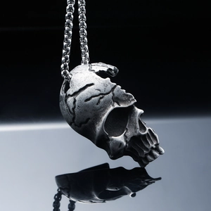 Gothic skull pendant necklace in vintage stainless steel with mirrored reflection