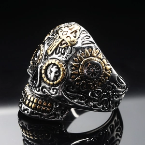 Gothic skull ring in stainless steel with golden cross and vintage sun ray carvings