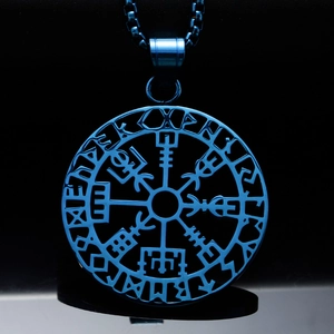 Macro detail of blue electroplated Viking Vegvisir compass pendant with Nordic rune engraving
