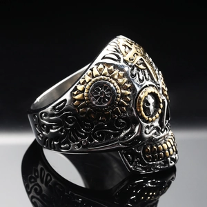 Punk vintage skull ring in stainless steel with golden cross and floral engravings
