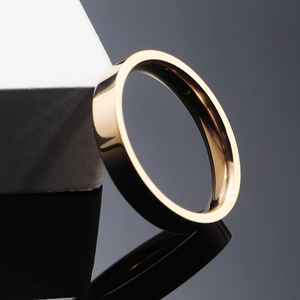 Polished rose gold minimalist stainless steel ring with a smooth mirror finish