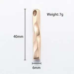 Rose gold twisted vertical bar pendant in stainless steel, 40mm height, minimalist style