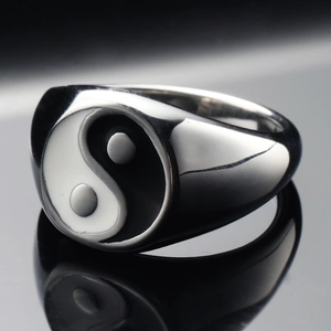 Polished stainless steel signet ring featuring a black and white Yin Yang Tai Chi pattern