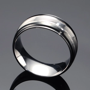 Polished silver titanium steel ring for men featuring grooved black diagonal stripes