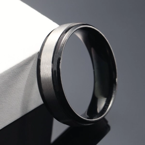 Brushed silver stainless steel ring with black polished edges in a minimalist style