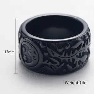 Retro black celestial ring featuring sun and moon relief carvings in 12mm width