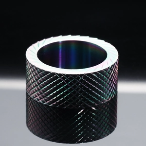 Macro detail of industrial style iridescent inner band with diamond knurling texture