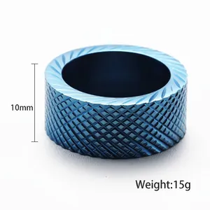 Minimalist blue stainless steel ring with diamond knurling texture and 10mm band width