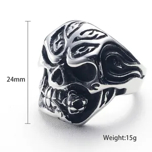 Punk style stainless steel skull ring with rose detail, 24mm height and 15g weight