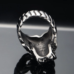 Vintage gothic crow skull ring in stainless steel with hollow design and textured band