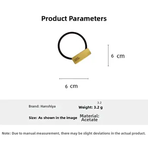 Macro detail of elastic hair tie with yellow acetate plate and size specifications