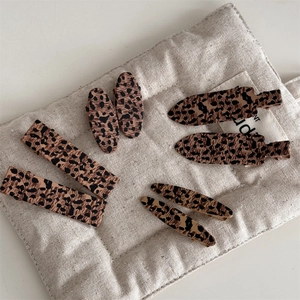 Eight-piece set of trendy leopard print hair clips in various geometric shapes