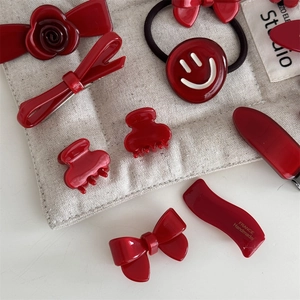 Elegant red bow and floral hair clip set with handmade acetate finish for women