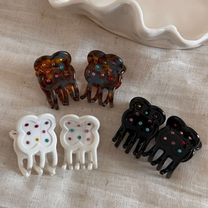 Polka dot acetate flower hair claws with colorful rhinestones in multiple colors
