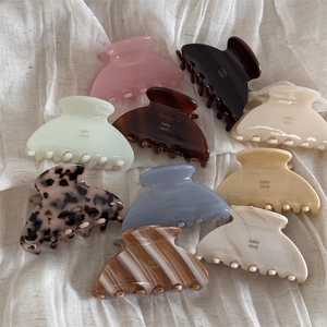 French style acetate hair claws in various jelly colors and tortoiseshell patterns